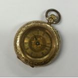 A small gold and enamelled fob watch with gilt dia