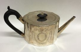 A good Georgian bright cut teapot decorated with s