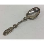 A Dutch silver souvenir spoon decorated with scrol