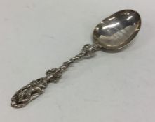 A Dutch silver souvenir spoon decorated with scrol