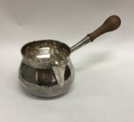 A large Georgian silver brandy pan of typical form