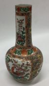 A Canton baluster shaped vase decorated with flowe