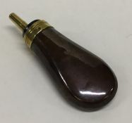 An unusual small brass and copper shot flask with