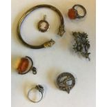 A silver gilt torque bangle, brooch etc. Approx. 4