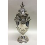 A large Edwardian silver half fluted caster with s