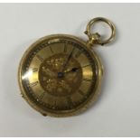 A lady's 18 carat open face fob watch with gilt di