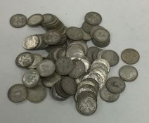 A bag containing silver and other sixpences etc. E