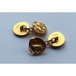 A pair of high carat gold circular cufflinks decor