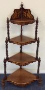 An Edwardian inlaid mahogany corner what-not with