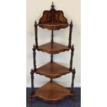 An Edwardian inlaid mahogany corner what-not with