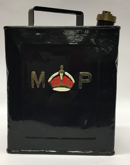 An "M P" fuel can. (1).