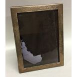 A modern Continental silver picture frame. Approx.