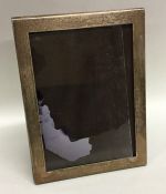 A modern Continental silver picture frame. Approx.