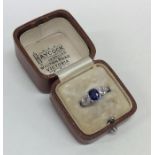 An attractive French platinum, sapphire and diamon