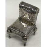 A novelty silver model of a Sudan chair with scrol