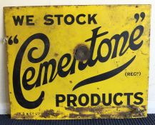 A large "We Stock Cementone Products" metal and en