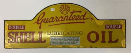 A "Double Shell Lubricating Oil" metal sign. Appro