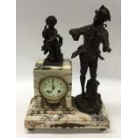 A marble and brass mounted clock garniture with en