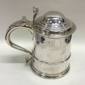 A good George I silver lidded tankard with taperin