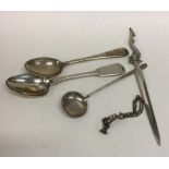 A silver paper knife together with spoons etc. App