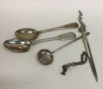 A silver paper knife together with spoons etc. App