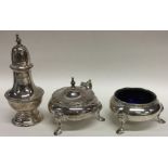 A good quality silver three piece cruet set. Sheff