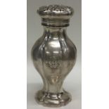 A Continental silver sugar caster with pierced top