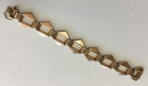 A 9 carat fancy link bracelet with concealed clasp