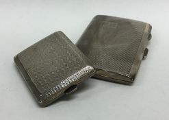 Two silver engine turned cigarette cases. Approx.