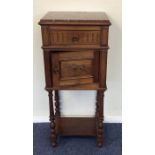A Continental marble top bedside cabinet with turn