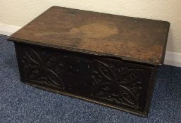 An Antique oak carved bible box with hinged top. E