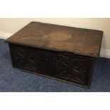 An Antique oak carved bible box with hinged top. E