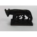 A small bronze figure of Romulus and Remus with the She-Wolf on square cast