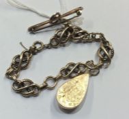 A 9 carat bracelet together with a brooch. Approx.