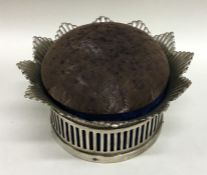 A large Continental silver pin cushion with flower