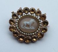 An attractive Antique oval brooch with central har