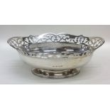 An Edwardian silver sweet dish with reeded border.