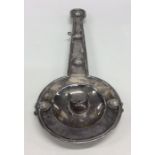 An unusual Dutch 18th Century tapering silver cand