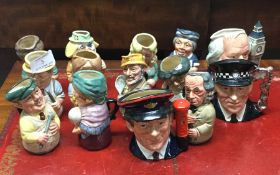 A group of Royal Doulton miniature Toby jugs.