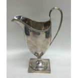 A good Georgian silver Adams' style cream jug with