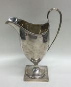 A good Georgian silver Adams' style cream jug with