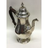 A good quality silver coffee pot of baluster form