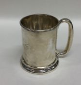 An Edwardian silver tapering mug. Birmingham. Appr