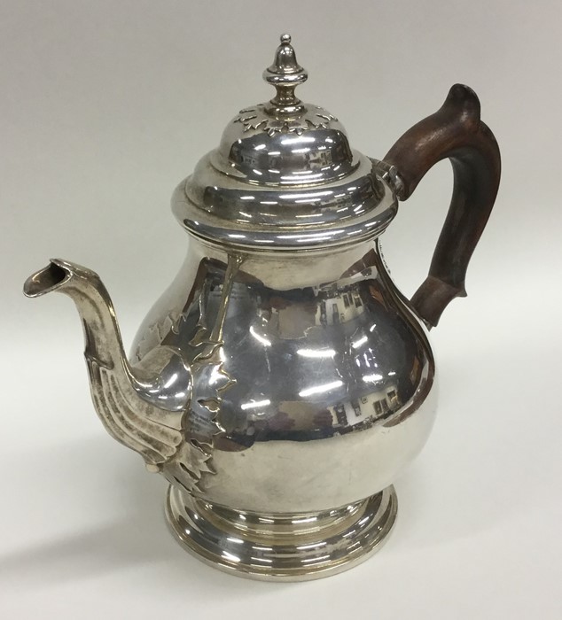 A heavy Georgian style silver teapot decorated wit - Image 2 of 2