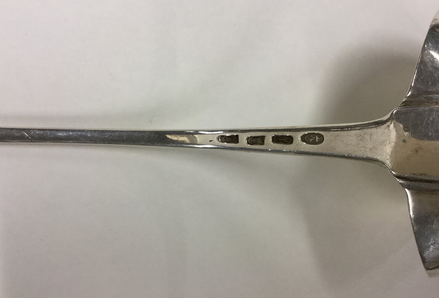 A Georgian OE pattern silver bottom marked ladle. - Image 2 of 2