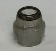 A silver reeded match striker of tapering form. Ap