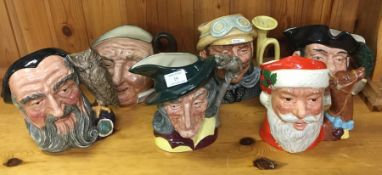 A group of Royal Doulton Toby jugs.
