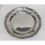 A heavy circular Georgian silver dinner plate with