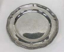 A heavy circular Georgian silver dinner plate with