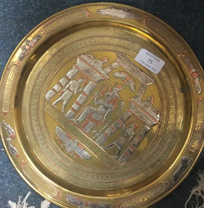 A brass and silver mounted Egyptian plate.